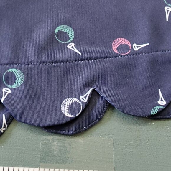 Lilly green skort. Navy blue with golf balls. Size Small. Scalloped hem. - Picture 2 of 11